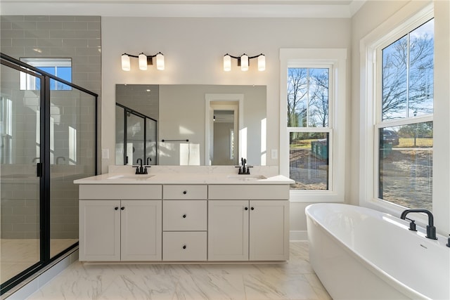 bathroom featuring shower with separate bathtub, double sink vanity, and tile patterned flooring