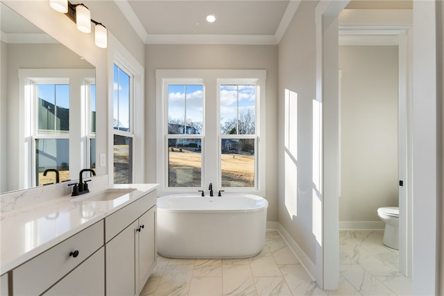 bathroom featuring vanity, toilet, tile patterned flooring, and ornamental molding