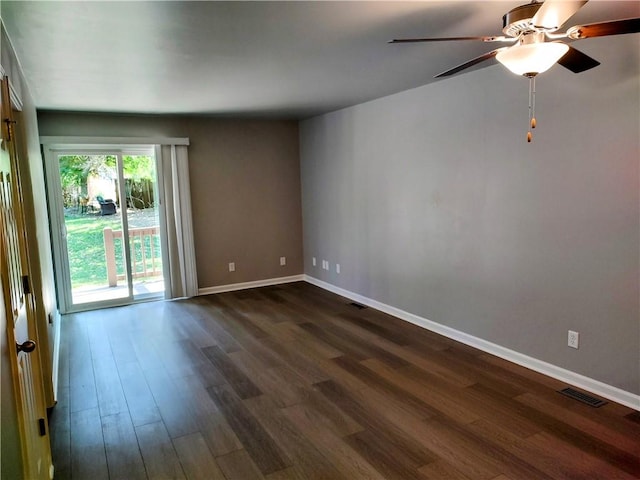 unfurnished room with dark wood-type flooring and ceiling fan