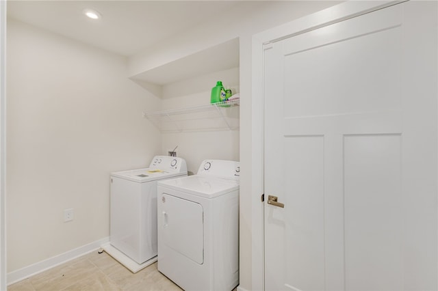 laundry area featuring washing machine and dryer