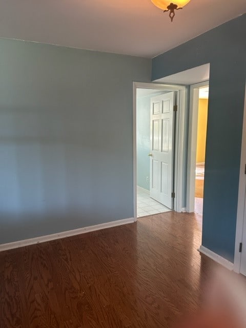 spare room featuring light wood-type flooring