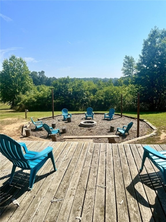 deck with a fire pit