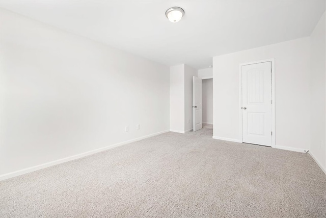 empty room featuring carpet floors