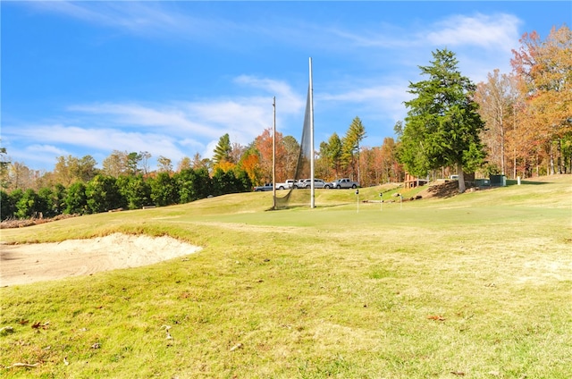 view of home's community featuring a lawn