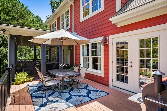 wooden deck featuring french doors