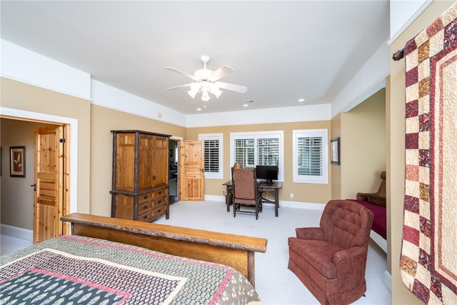 bedroom with ceiling fan and carpet flooring