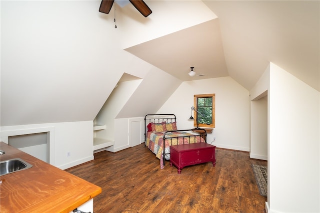 bedroom featuring vaulted ceiling, ceiling fan, and dark hardwood / wood-style floors