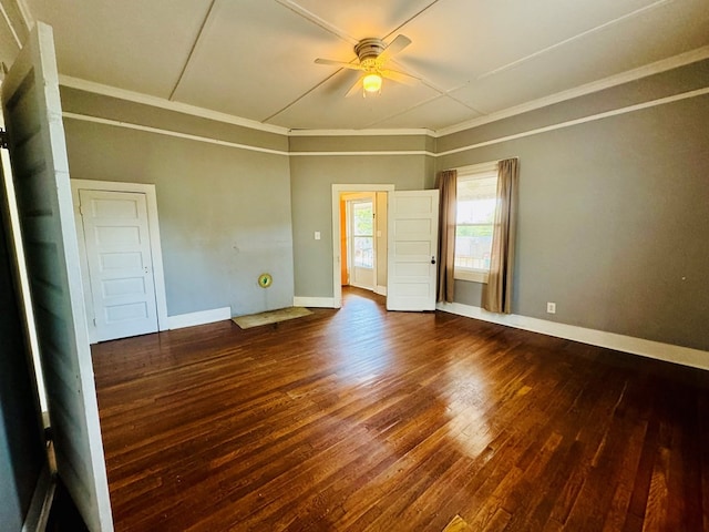 unfurnished room featuring ornamental molding, dark hardwood / wood-style flooring, and ceiling fan