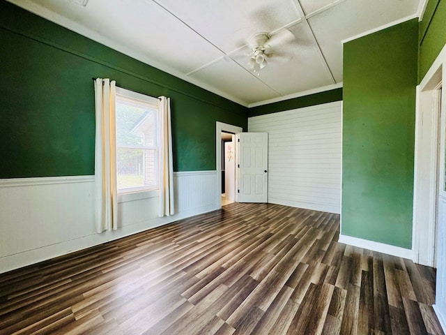 interior space with dark hardwood / wood-style floors and ceiling fan