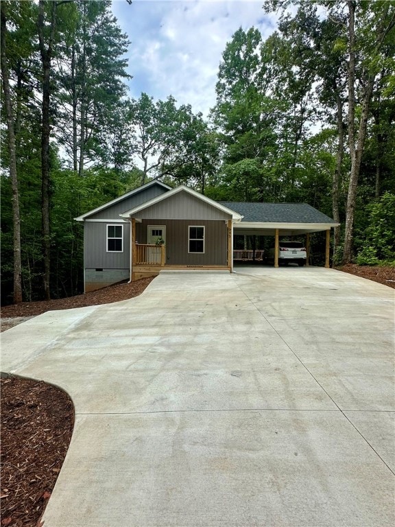 view of front of home featuring a carport