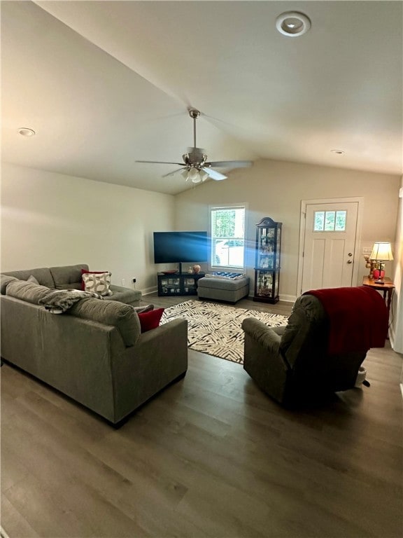 living room with wood-type flooring, lofted ceiling, and ceiling fan