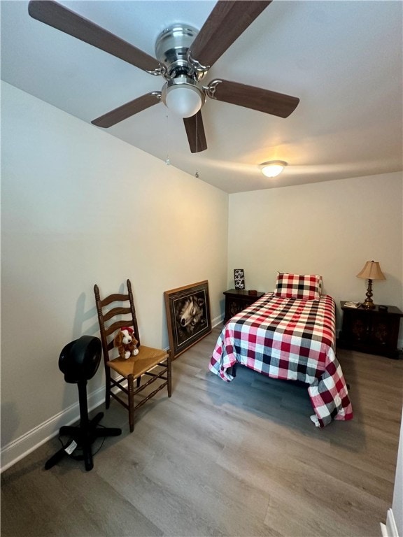 bedroom featuring light hardwood / wood-style floors and ceiling fan