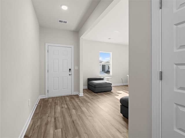 entryway with light hardwood / wood-style flooring