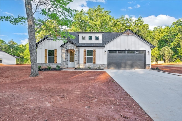 modern farmhouse style home featuring a garage