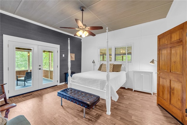 bedroom with multiple windows, ceiling fan, french doors, and access to exterior