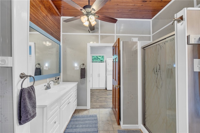 bathroom featuring walk in shower, vanity, tile patterned floors, and wooden ceiling