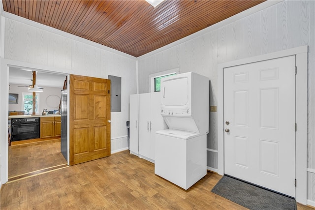 washroom with stacked washing maching and dryer, light wood-type flooring, wooden ceiling, ceiling fan, and electric panel