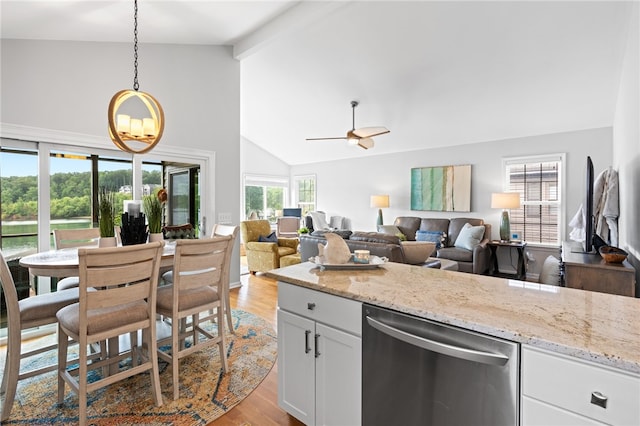 kitchen with white cabinets, dishwasher, vaulted ceiling with beams, ceiling fan, and light hardwood / wood-style flooring