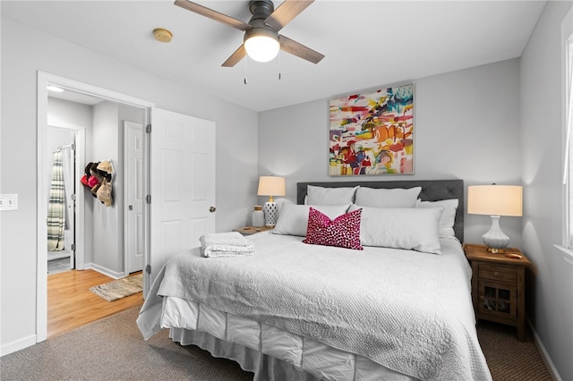 bedroom with ceiling fan and carpet flooring