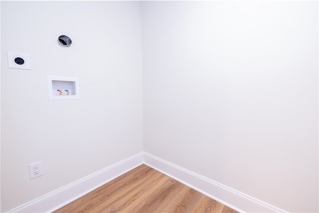 laundry room with wood-type flooring, hookup for an electric dryer, and hookup for a washing machine