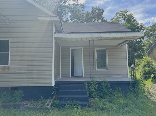 entrance to property with covered porch