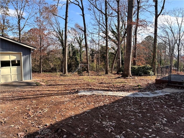 view of yard with a garage