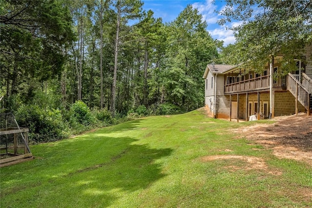 view of yard with a deck