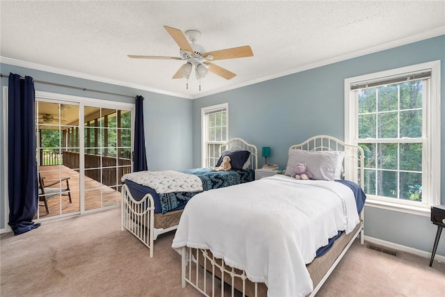 bedroom with ornamental molding, light colored carpet, and access to exterior