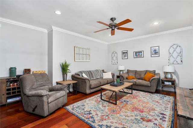 living room with ceiling fan, ornamental molding, and dark hardwood / wood-style flooring