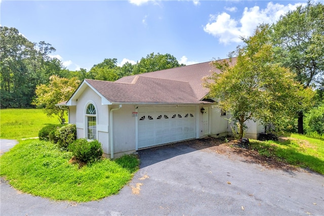 view of side of home with a garage