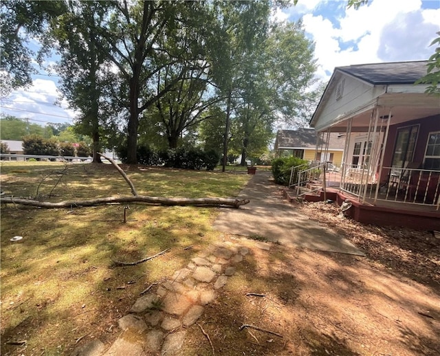 view of yard with a wooden deck