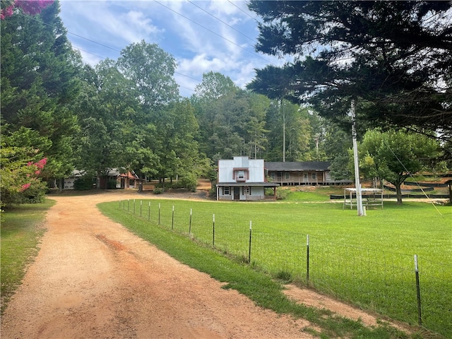 view of yard with a rural view