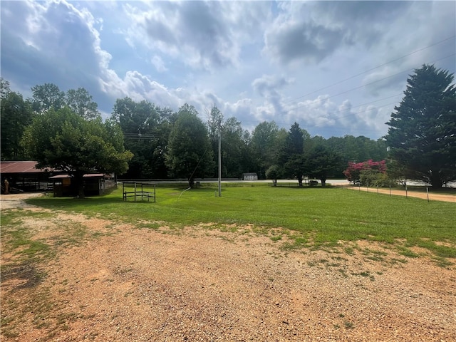 view of home's community featuring a lawn