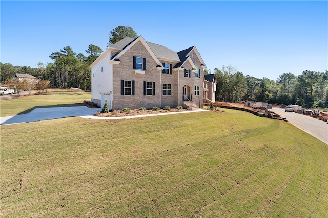 view of front of home with a front lawn