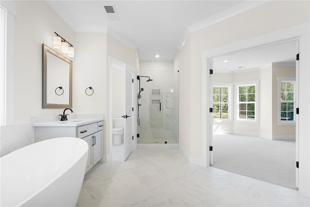 full bathroom featuring vanity, crown molding, separate shower and tub, and toilet