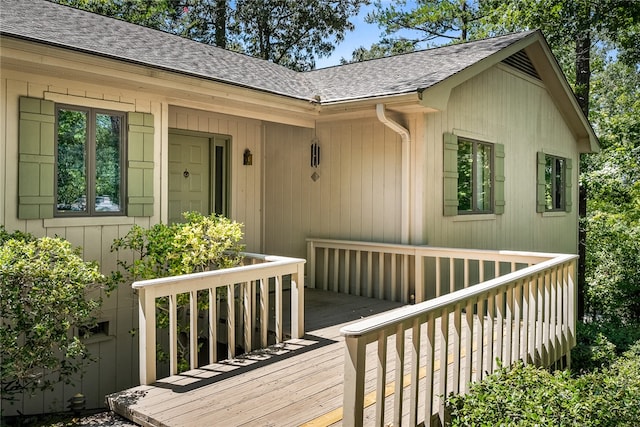 entrance to property with a wooden deck