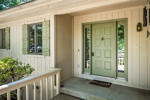 doorway to property featuring a porch