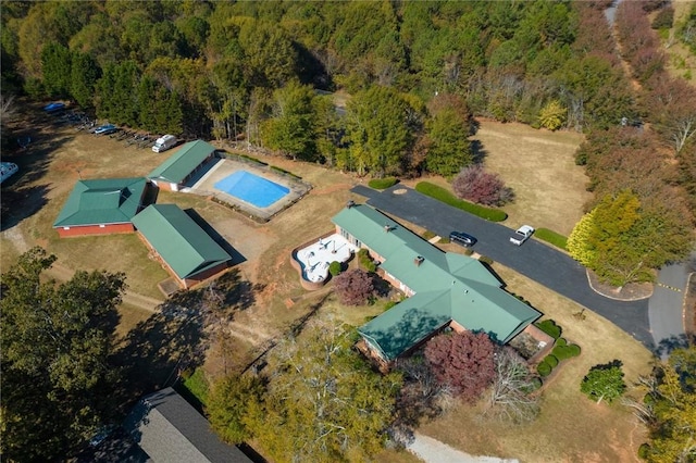 aerial view with a wooded view
