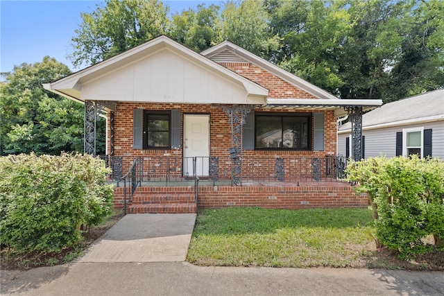 bungalow-style home with covered porch