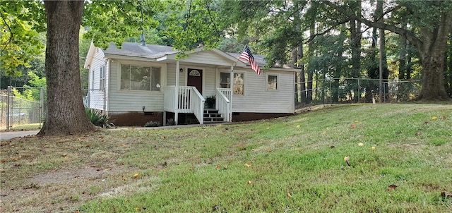 view of front of property with a front lawn