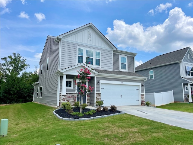 view of front facade with a front yard and a garage