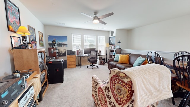 carpeted office with ceiling fan