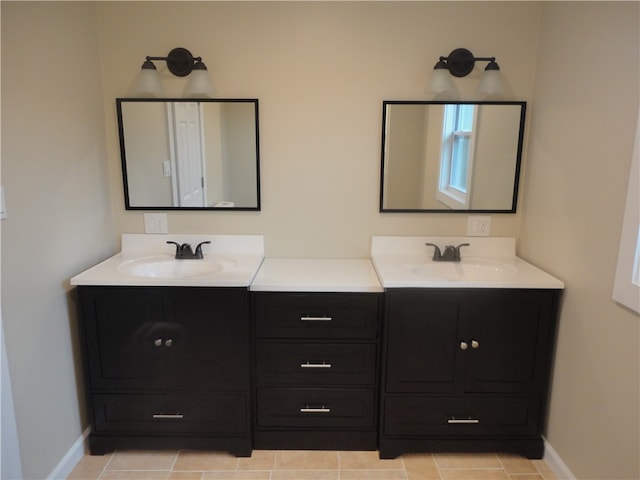 bathroom with vanity and tile patterned floors