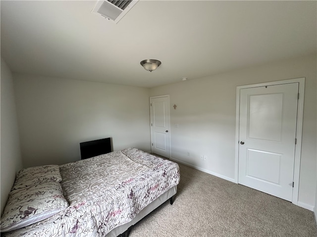 bedroom featuring carpet