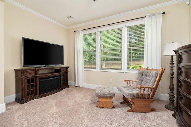 living area with carpet floors and crown molding