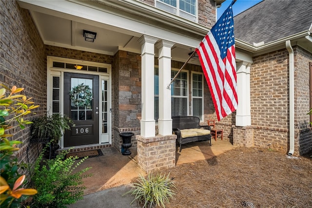 entrance to property with covered porch