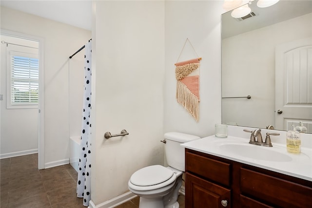 full bathroom with vanity, shower / tub combo, toilet, and tile patterned flooring