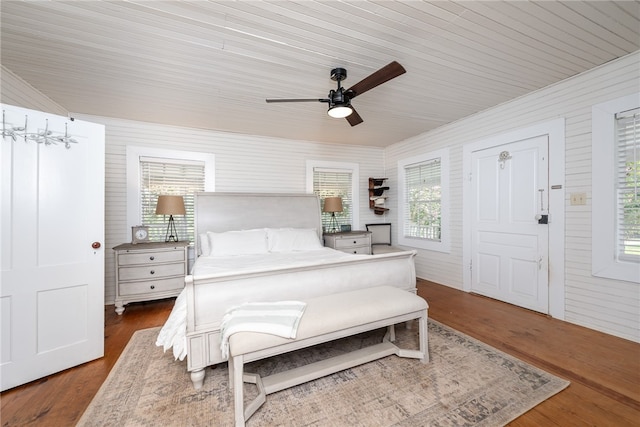 bedroom featuring wooden ceiling, ceiling fan, and dark hardwood / wood-style floors