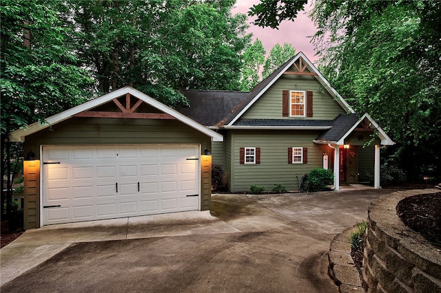 craftsman house with a garage