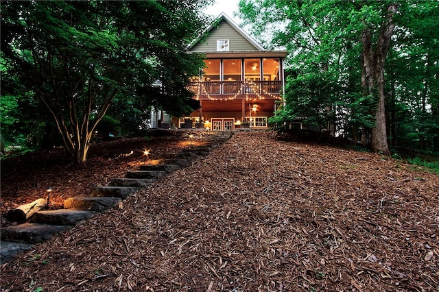 view of yard featuring a sunroom